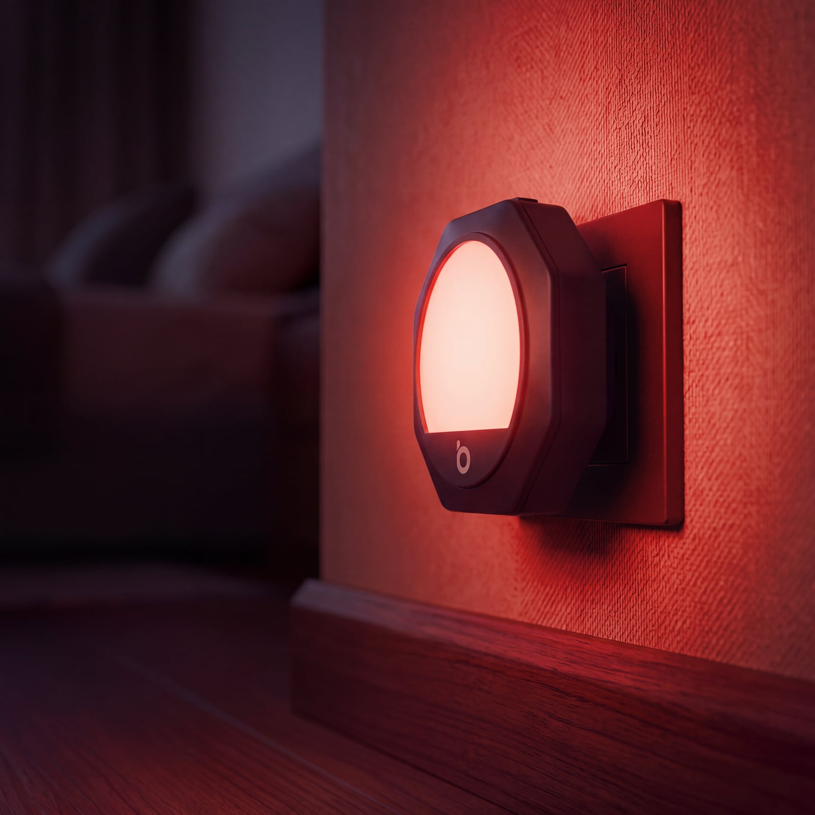 Luce notturna rossa sulla parete di una camera da letto